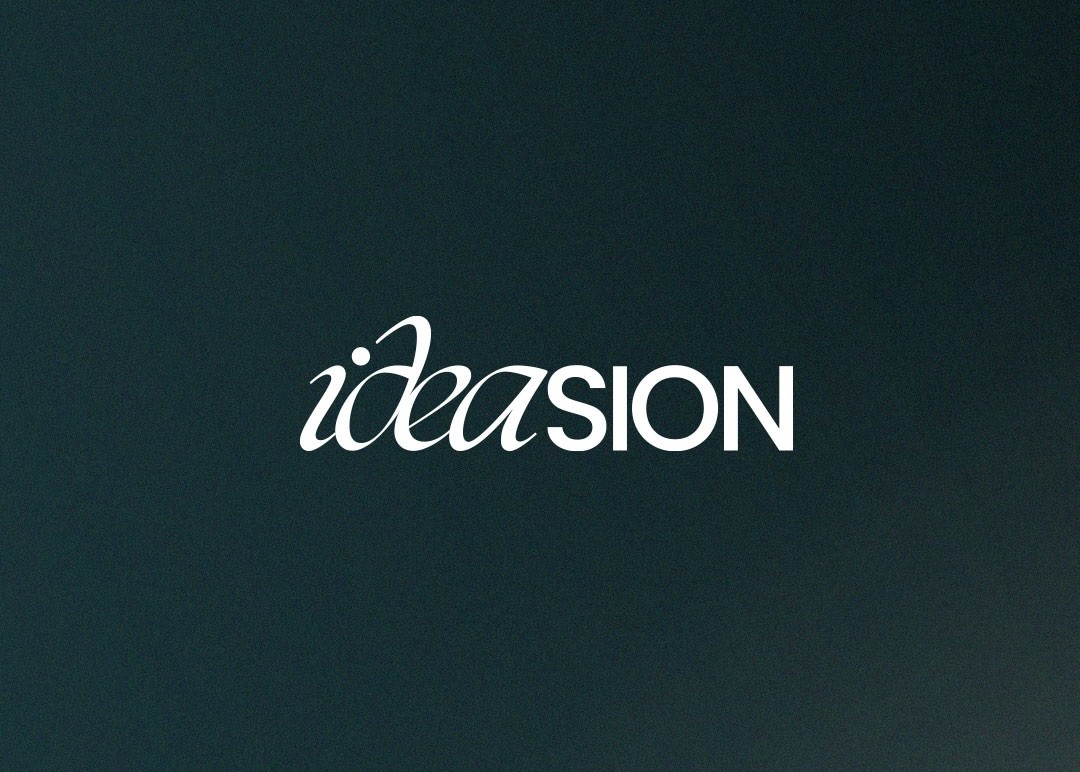 ideasion creative studio website shown on desktop and mobile among reflective geometric forms