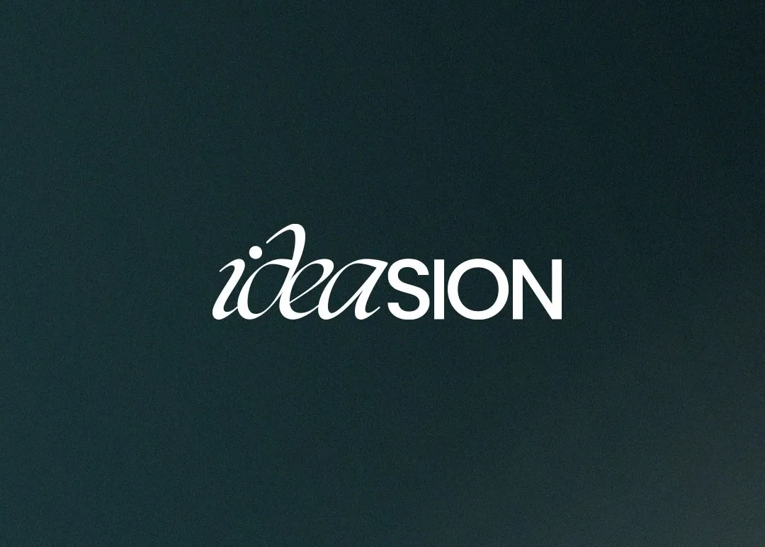 ideasion creative studio website shown on desktop and mobile among reflective geometric forms